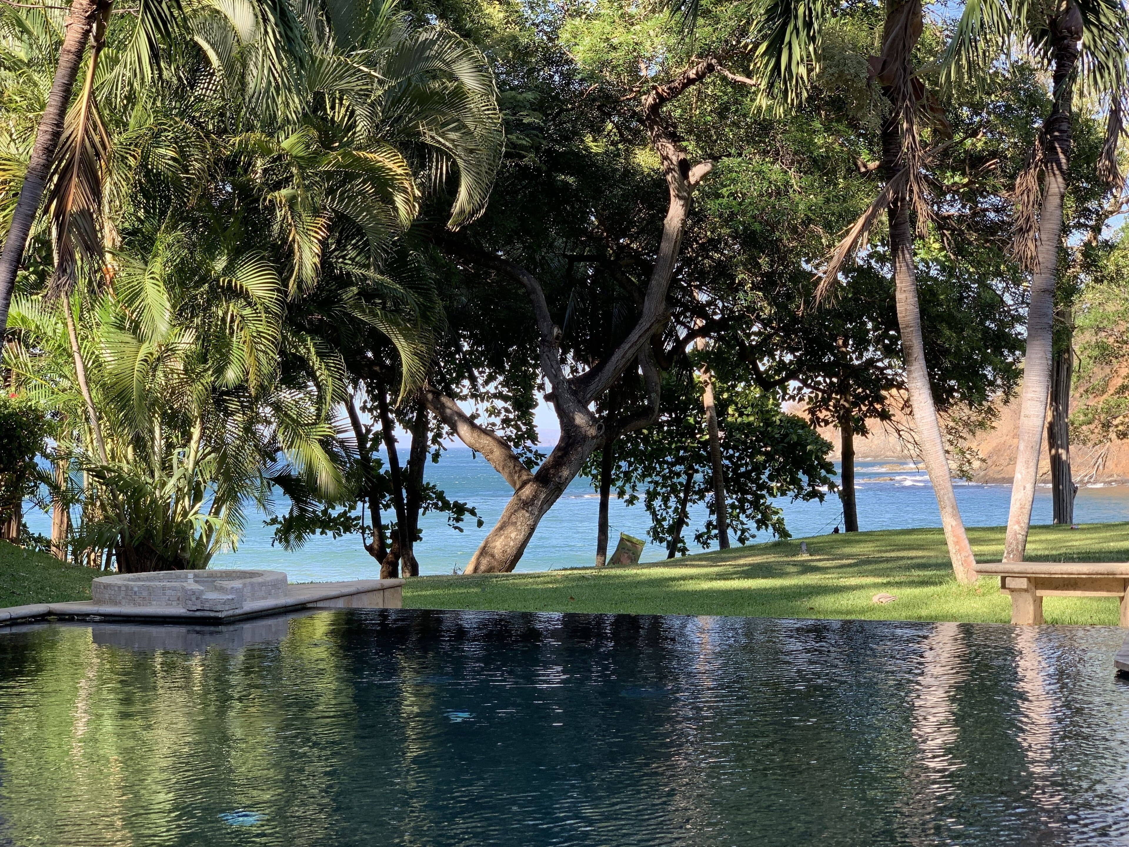 View of the ocean over the private pool at Villa Las Olas